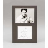 Elvis Presley, schwarz-weiß-Foto (neuerer Abzug) und Autograph "Sincerely Elvis Presley".Beide in