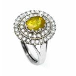Saphir-Brillant-Ring WG 585/000 mit einem oval fac. gelben Saphir 2,50 ct und 44Brillanten, zus. 1,