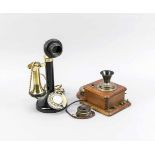 2 historische Telefone, 1. V. 20. Jh., 1x runder Sockel mit Wählscheibe, Säulenschaft,Bakelit-