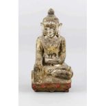 Buddha, wohl Thailand, 19. Jh., Holz mit Resten einer polychromen Fassung/Kreidegrund undVergoldung.
