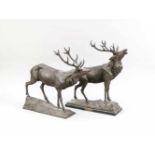 Zwei Jägerpreise um 1900, patinierte Metallgussfiguren von kapitalen Hirschen, einer inder Plinthe