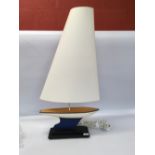 A DAVID HUNT DESIGNER LAMP IN THE FORM O