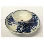 A LOWESTOFT SMALL SIZE TEA BOWL AND SAUC