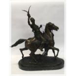 A LARGE IMPRESSIVE BRONZE OF A FALCONER