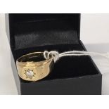 A GENTS 9CT GOLD AND DIAMOND RING, THE C