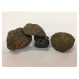 FOUR BELIEVED METEORITES, ALL APPROX 5C