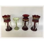 A PAIR AND A SINGLE RUBY GLASS LUSTRES W