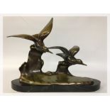 AN ART DECO PATINATED BRONZE OF SEAGULLS