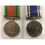 MEDALS: GROUP OF TWO, DEFENCE, POLICE LS