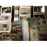 BOX OF SUBJECT POSTCARDS IN THREE ALBUMS