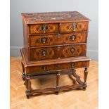 A largely early 18th century walnut, floral marquetry inlaid chest on stand, the crossbanded quarter