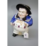 A 19th century continental porcelain Jolly Jack-Tar figural tobacco jar, painted in colours, 24cm