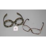 Two pairs of Christian Dior spectacle frames, faux tortoiseshell and circular with blue, white and
