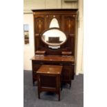 An Edwardian mahogany and boxwood strung single wardrobe with swag panel detail, together with a