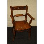 A 19th century beech and elm Oxford bar back armchair with saddle seat on baluster turned tapering