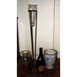 Two cylindrical tapering clear glass vases, one with wrought iron stand, a Continental earthenware