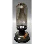 A mid 20th century Duplex paraffin storm lantern with clear glass domed reservoir and cylindrical