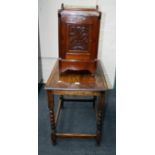 An Edwardian mahogany coal purdoneum with brass gallery, marble top and metal liner with shovel,