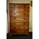 An early 19th century mahogany chest on chest in two sections with two short and six graduated