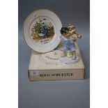 Seven Royal Worcester/Doulton Christmas plates, (six boxed), a Royal Worcester figure 'Piggyback
