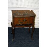 An early 20th century walnut and chinoiserie decorated sewing box, of bow front form, the hinged lid