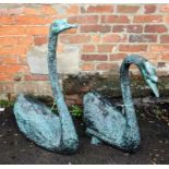 Two 20th century verdigris patinated cast metal garden swan ornaments, 70 and 90cm