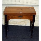 A small Edwardian rosewood card table, the swivel folding top with fan inlay over frieze drawer,