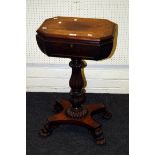 A William IV mahogany teapoy, the caddy top with vacant interior on baluster concave base and lion's