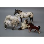 A Beswick Appaloosa stallion, a grey Connemara pony, Siamese cat and two other horses