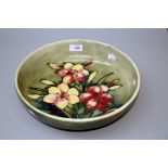 A large Walter Moorcroft Freesia pattern bowl, circa 1950's, pink and yellow flowers on a shaded