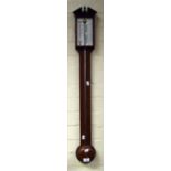 A 20th century mahogany stick barometer, the urn and broken architectural pediment over silvered