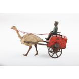A circa 1900 Lehmann tin-plate Africa post cart with driver, drawn by an ostrich, red cart with