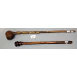 A 19th century possibly cherry wood shillelagh, with partly hide bound shaft, 62cm, together with an