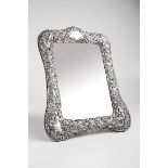 Probably William Comyns, a large early 19th century silver framed easel dressing mirror, richly