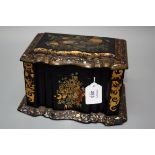 A Victorian papier maché mother of pearl inlaid and gilt florally decorated tea caddy, of serpentine