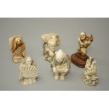 A group of six tagua and other netsuke, including a swivel faced man with fan, Kylin, man holding