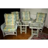 A set of four pale green painted cane conservatory wing back armchairs, together with a pair of