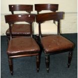 A set of four William IV mahogany dining chairs, each with bowed rail, overstuffed seat on reeded