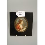 A 19th century portrait miniature of Lady Hamilton after G Romney, 9 x 6.5cm oval, in ebonised frame