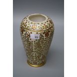 A 20th century Persian alabaster vase of shouldered tapering form with green red a gilded trailing