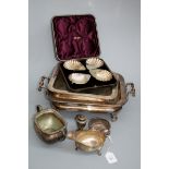 A Victorian cased set of four silver butter shells on ball feet, Birmingham 1887, a silver sauceboat