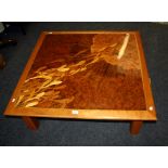 Colin Watmough, a cherry wood framed burr and specimen wood inlaid coffee table, decorated with fish