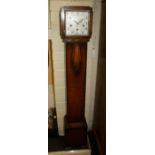 A 1930s oak cased Granddaughter clock, with eight day gong striking movement and silvered Arabic