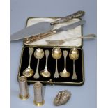 L J Millington, a silver salt and pepper, each fashioned as a shotgun cartridge, a miniature cast