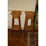 A pair of pine jardinière stands, each with square top, on splayed legs united by undertier, 87cm