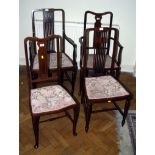 An Edwardian inlaid mahogany open arm salon chair, with shaped arms, together with a matching single