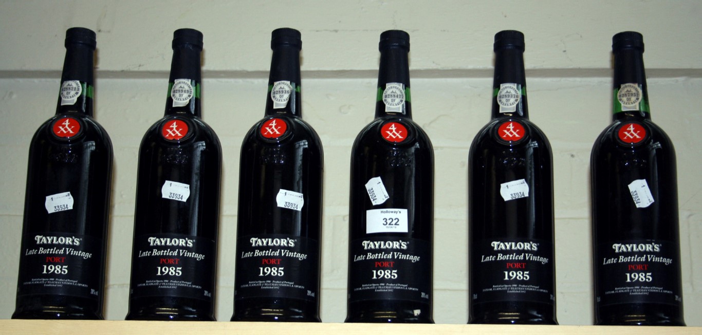 Six bottles of Taylor's 1985 Late Bottled Vintage Port, good levels, labels and capsules