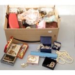 A large quantity of costume and paste set jewellery, wristwatches, amber-coloured and other bead