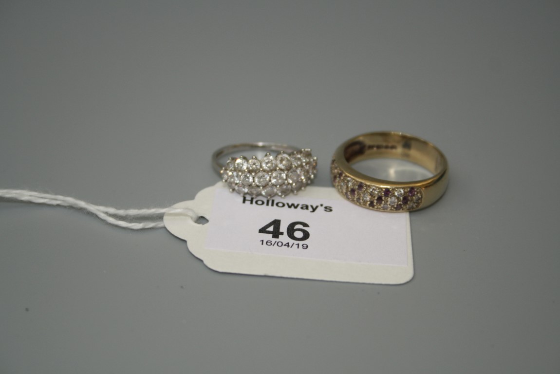A gem-set three row ring, 9ct gold mount and a 9ct white gold and cubic zirconium ring, 7.9g gross