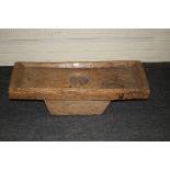 A 17th century hewn rustic game sink, with tray top, from a Warwickshire Manor House, 96cm lon